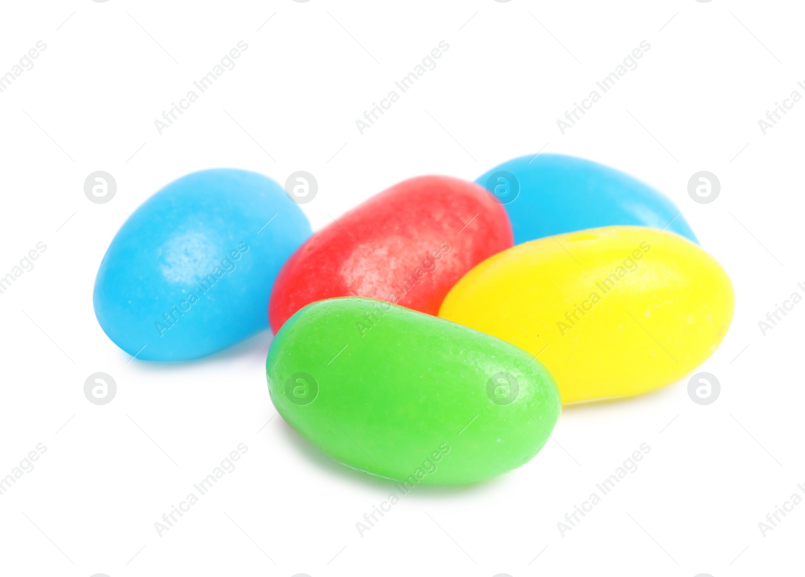 Photo of Delicious colorful jelly beans isolated on white