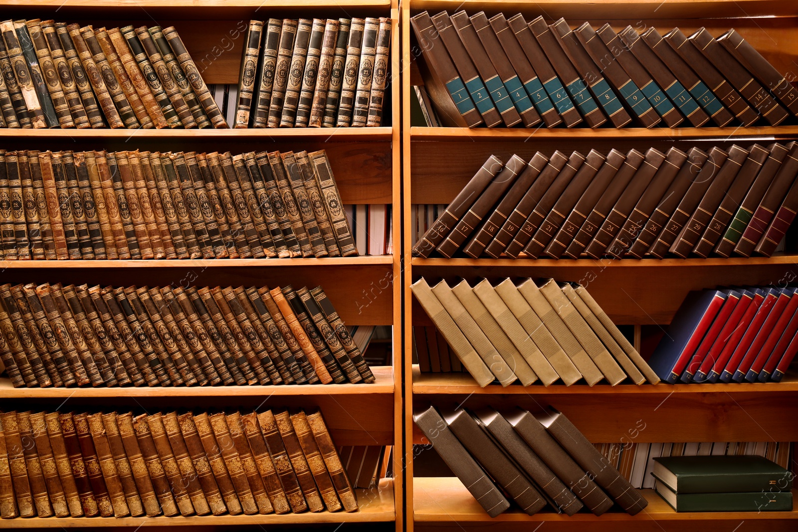 Image of Collection of different books on shelves in library