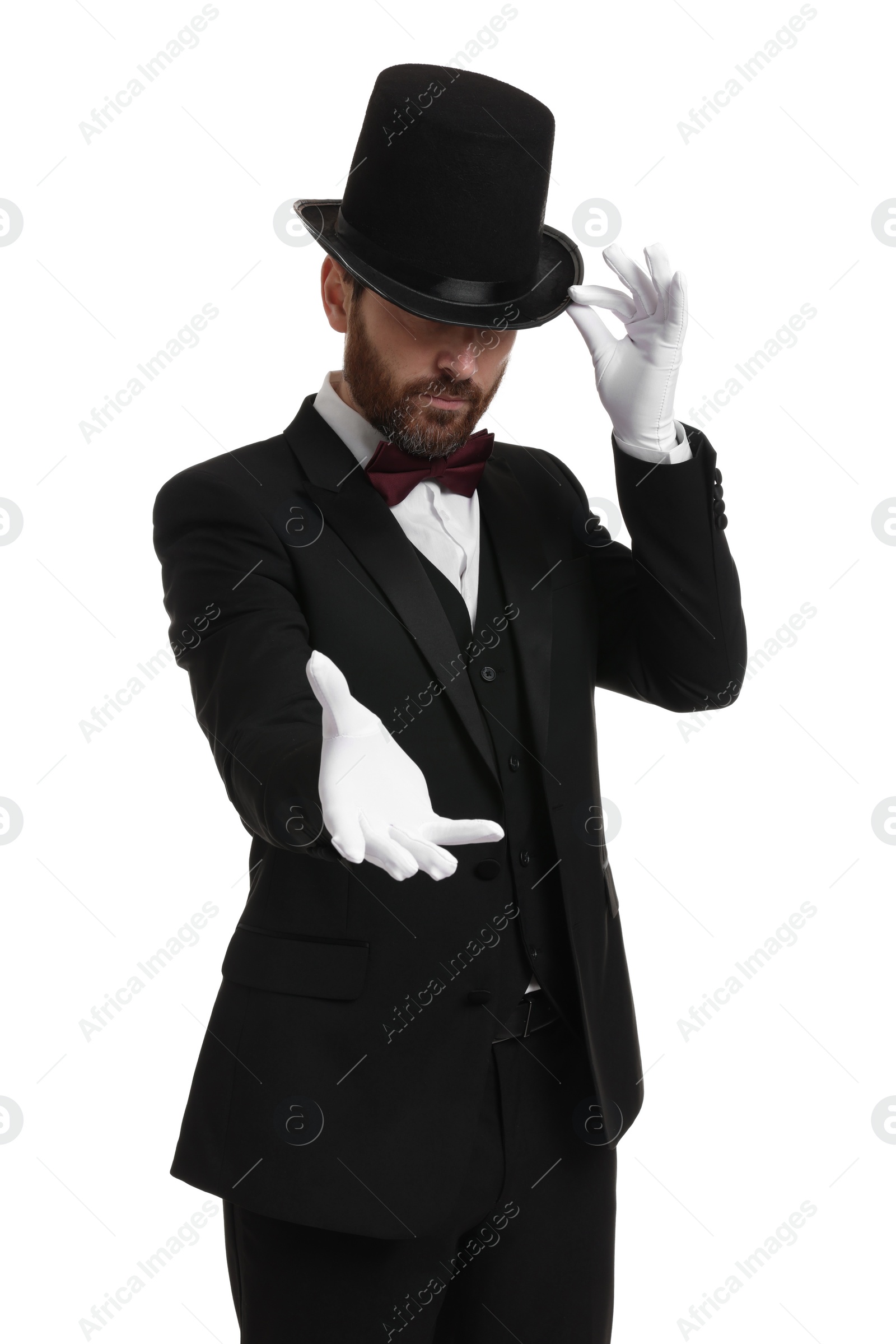 Photo of Magician in top hat on white background