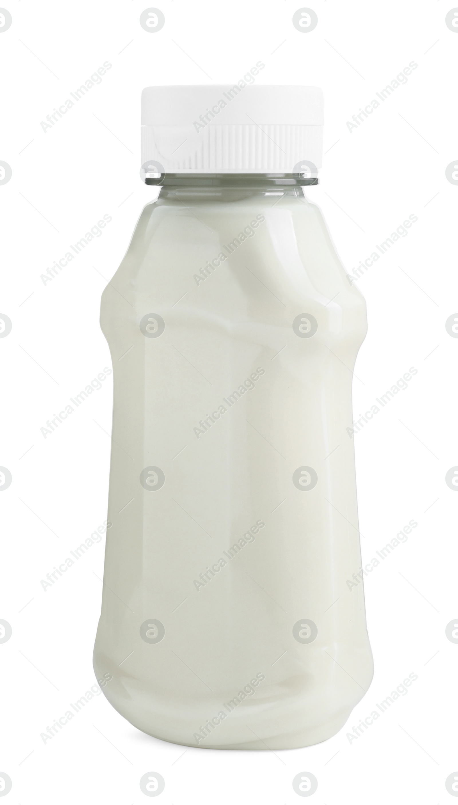 Photo of Fresh mayonnaise sauce in glass bottle isolated on white