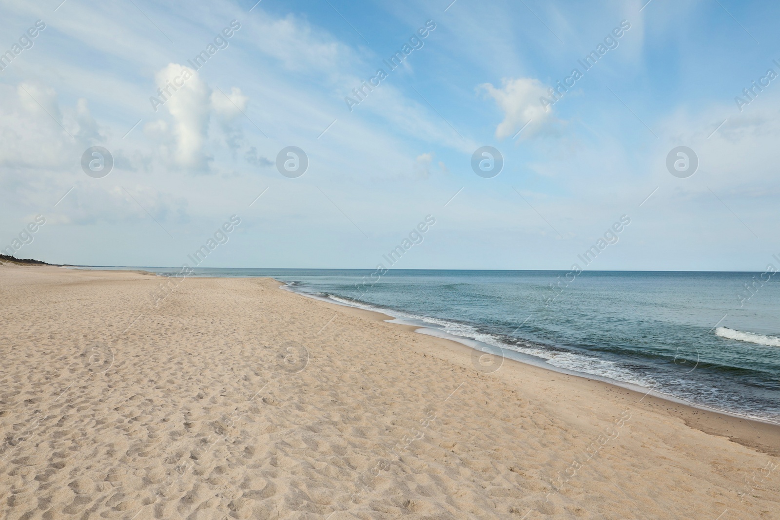 Photo of Beautiful view of sea shore and blue sky on sunny day