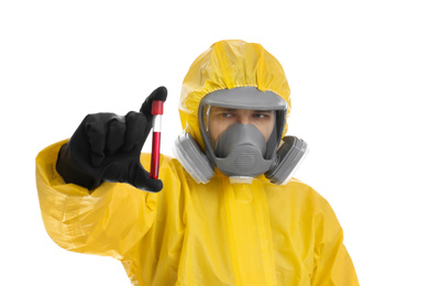 Photo of Man wearing chemical protective suit holding test tube with blood sample on white background. Prevention of virus spread