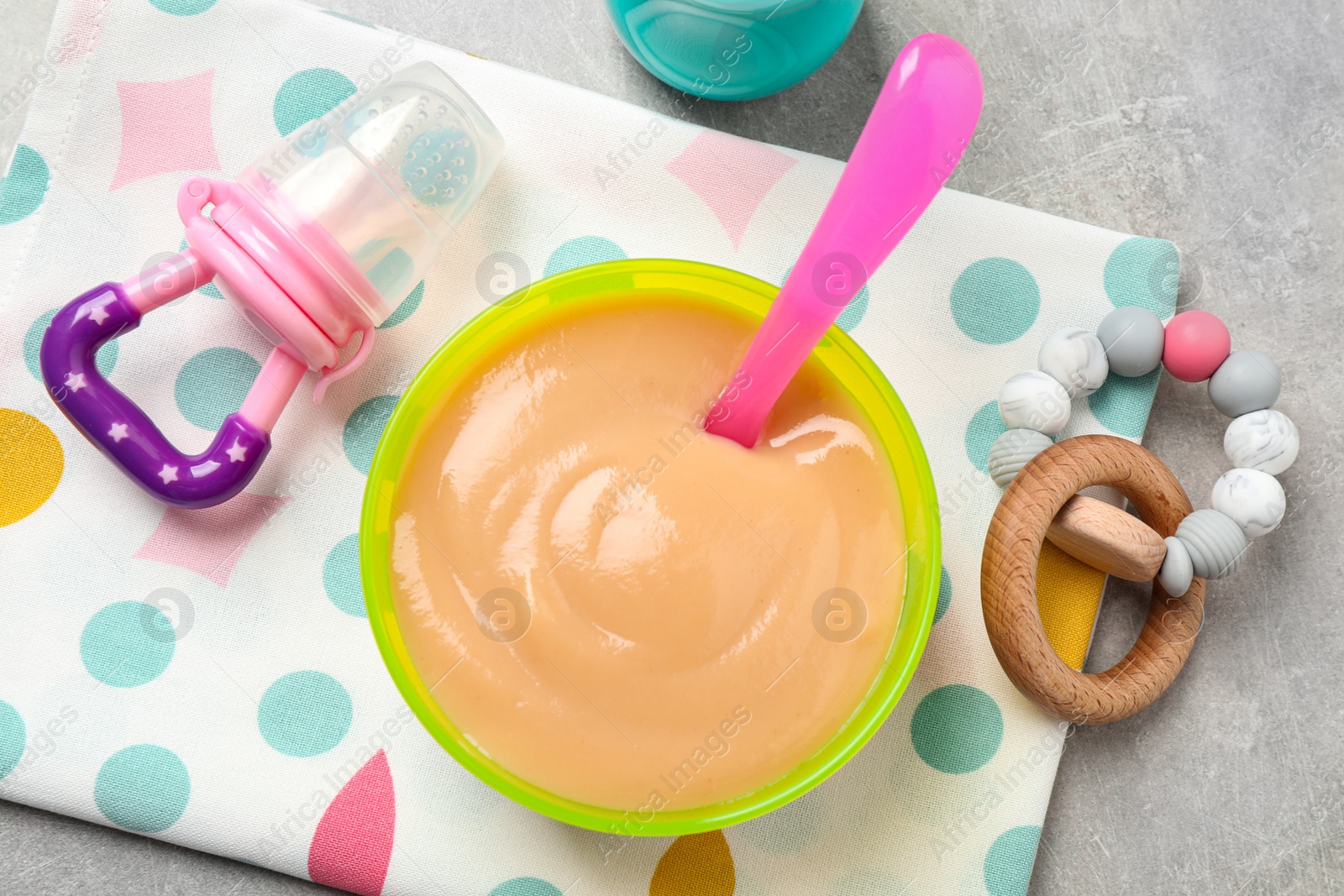 Photo of Flat lay composition with healthy baby food on grey table