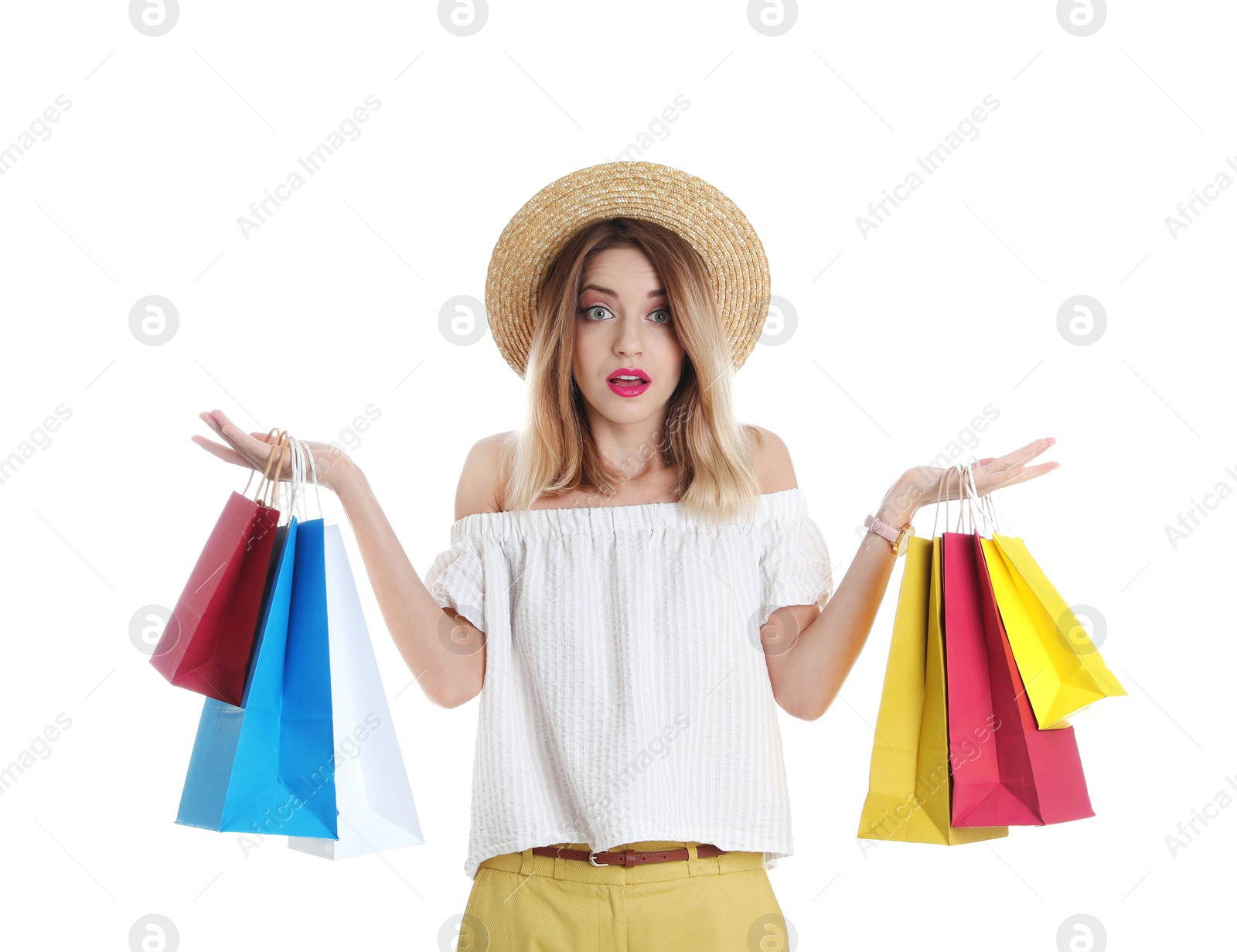 Photo of Beautiful young woman with shopping bags on white background