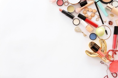 Photo of Flat lay composition with makeup products for woman on white background