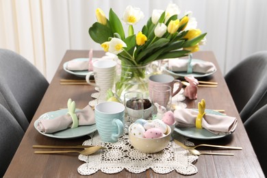 Photo of Festive table setting with beautiful flowers. Easter celebration