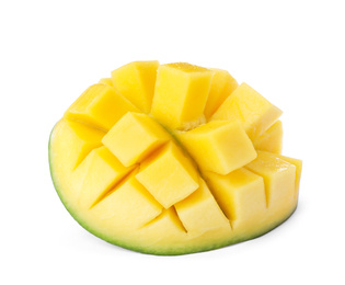 Half of ripe mango cut into cubes isolated on white