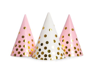 Bright birthday party hats on white background