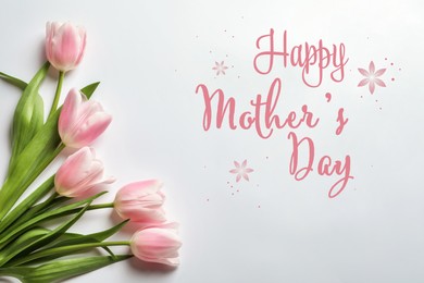 Image of Happy Mother's Day. Beautiful tulips on white background, flat lay