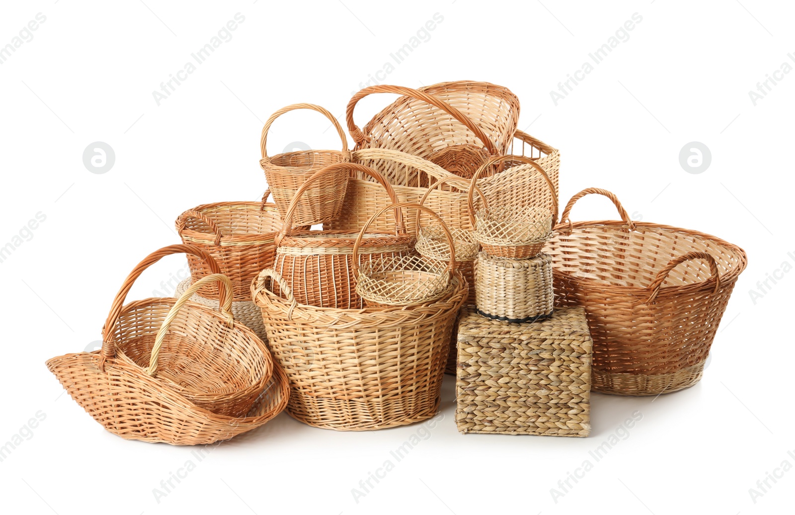 Photo of Many different wicker baskets isolated on white