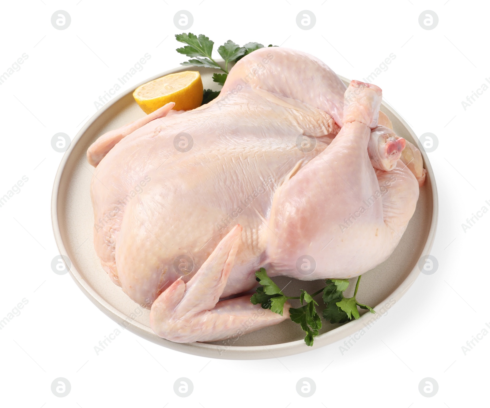 Photo of Fresh raw chicken with lemon and parsley isolated on white