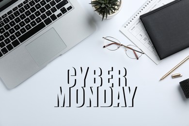Image of Cyber Monday Sale. Composition with laptop, glasses and stationery on white background, top view