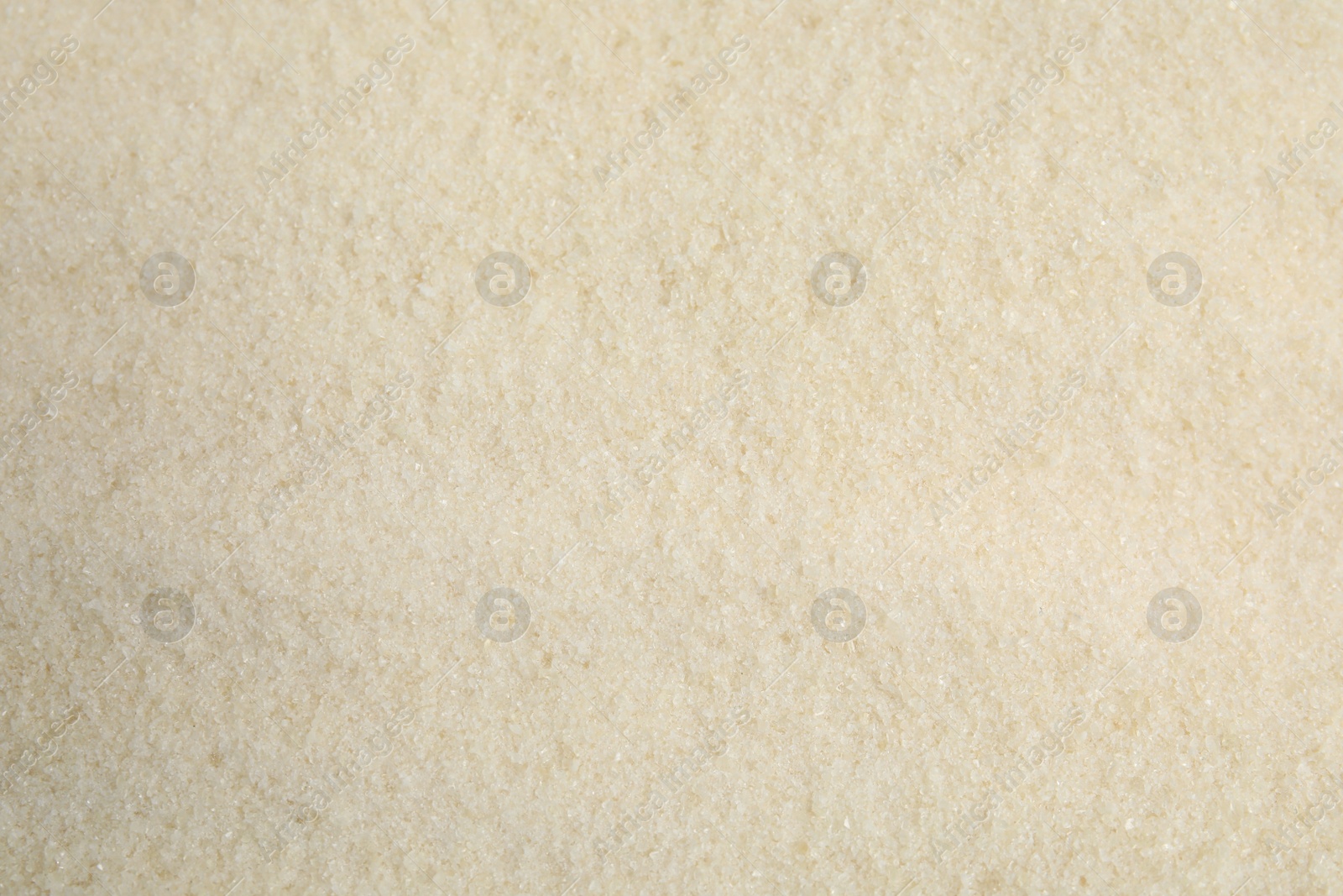 Photo of Dry gelatin powder as background, top view