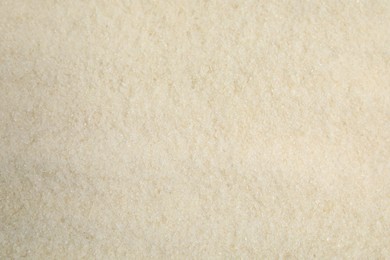 Dry gelatin powder as background, top view