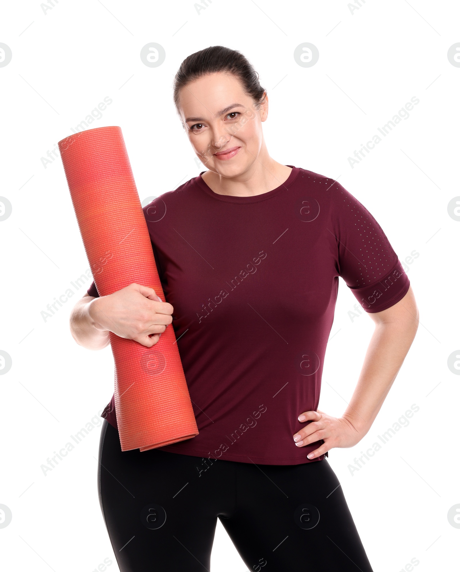 Photo of Happy overweight woman with yoga mat on white background