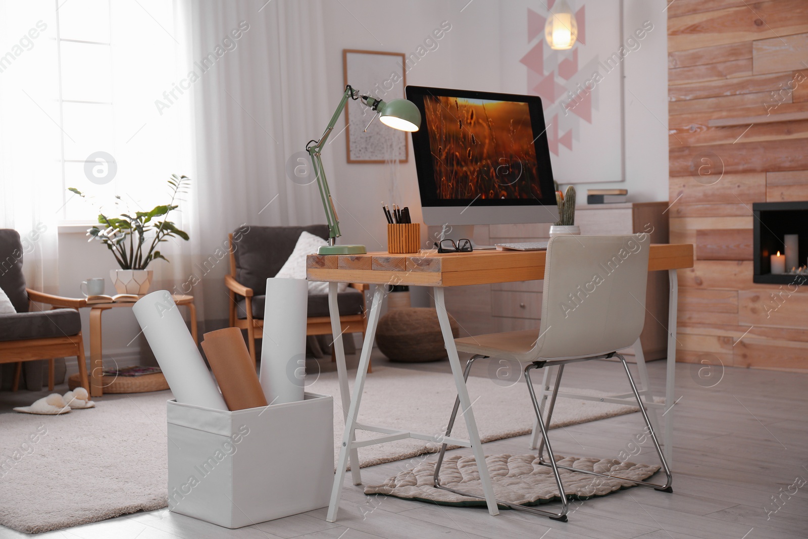 Photo of Comfortable workplace with modern computer on desk. Home office