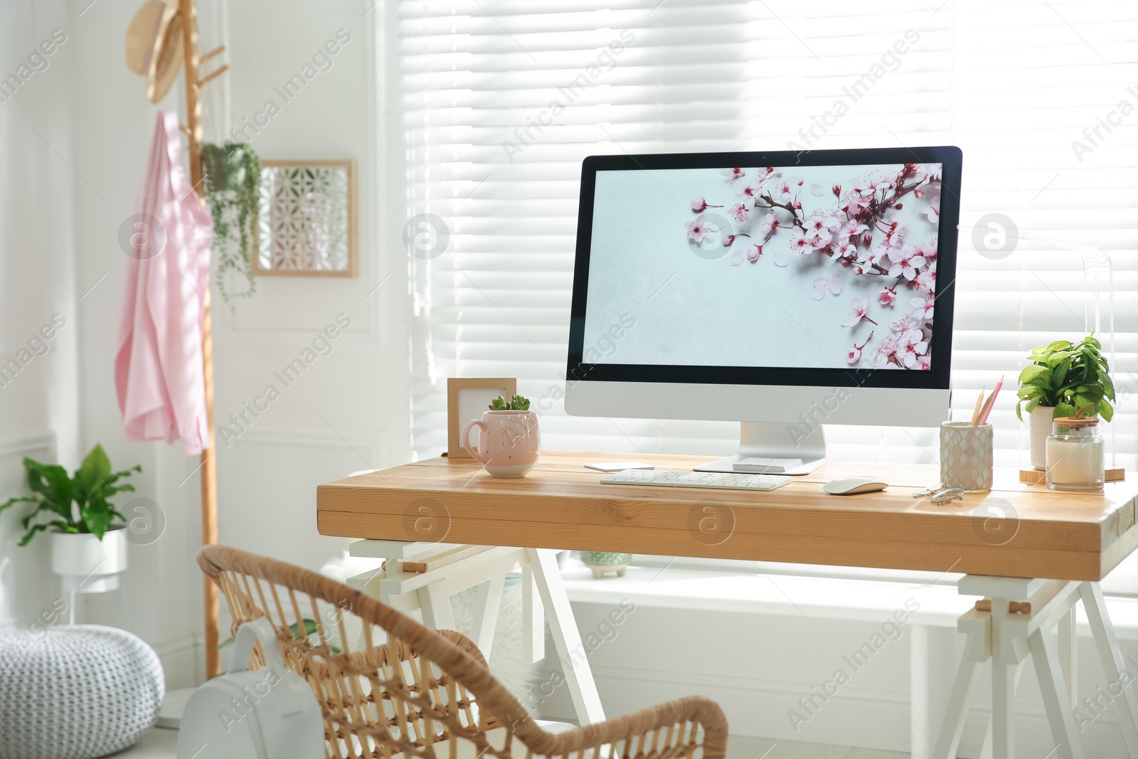 Photo of Stylish home office interior with comfortable workplace