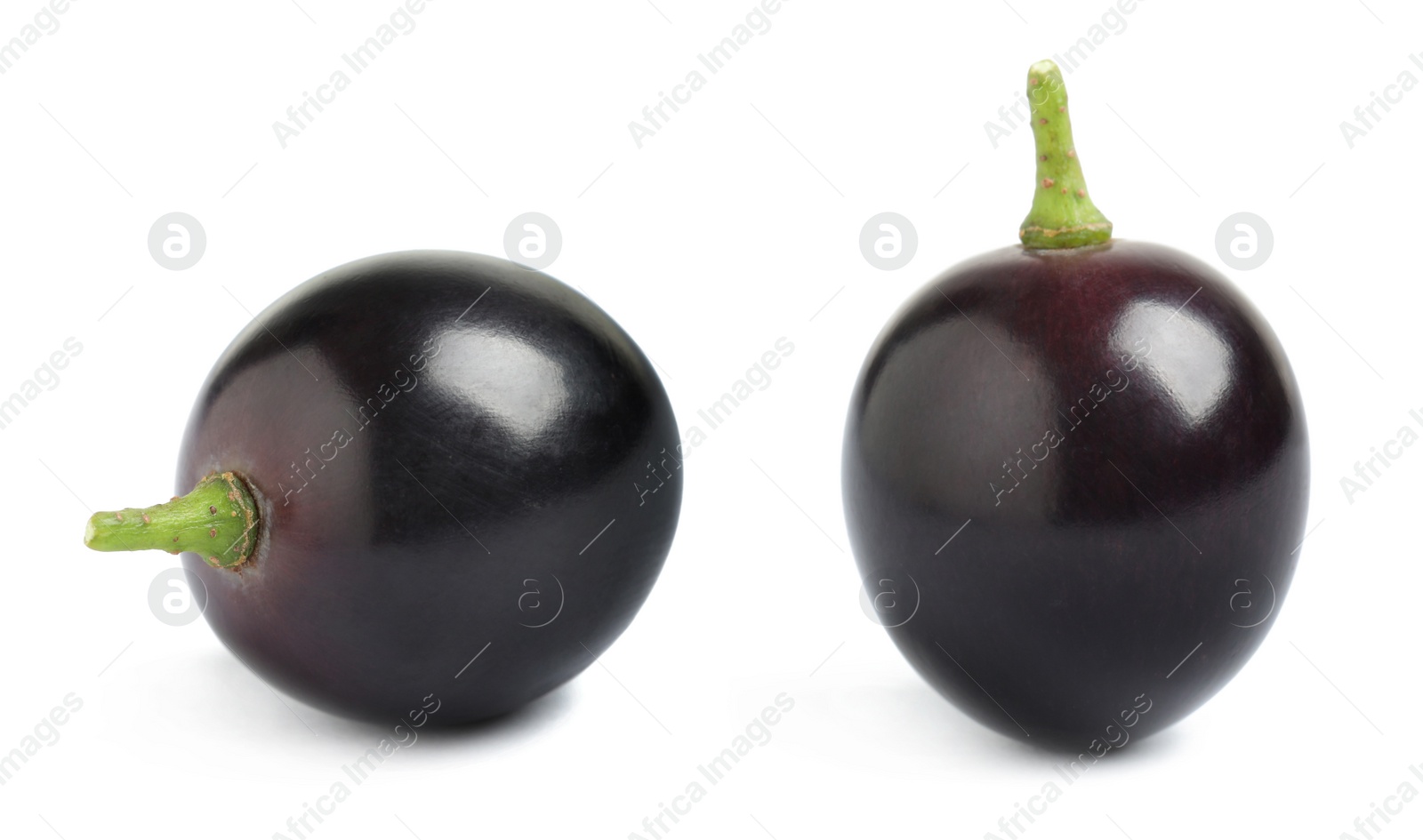 Image of Two fresh ripe grapes on white background