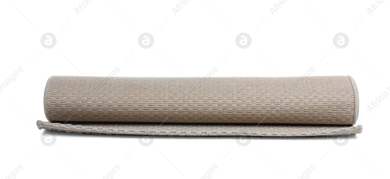 Photo of Rolled grey carpet on white background. Interior element