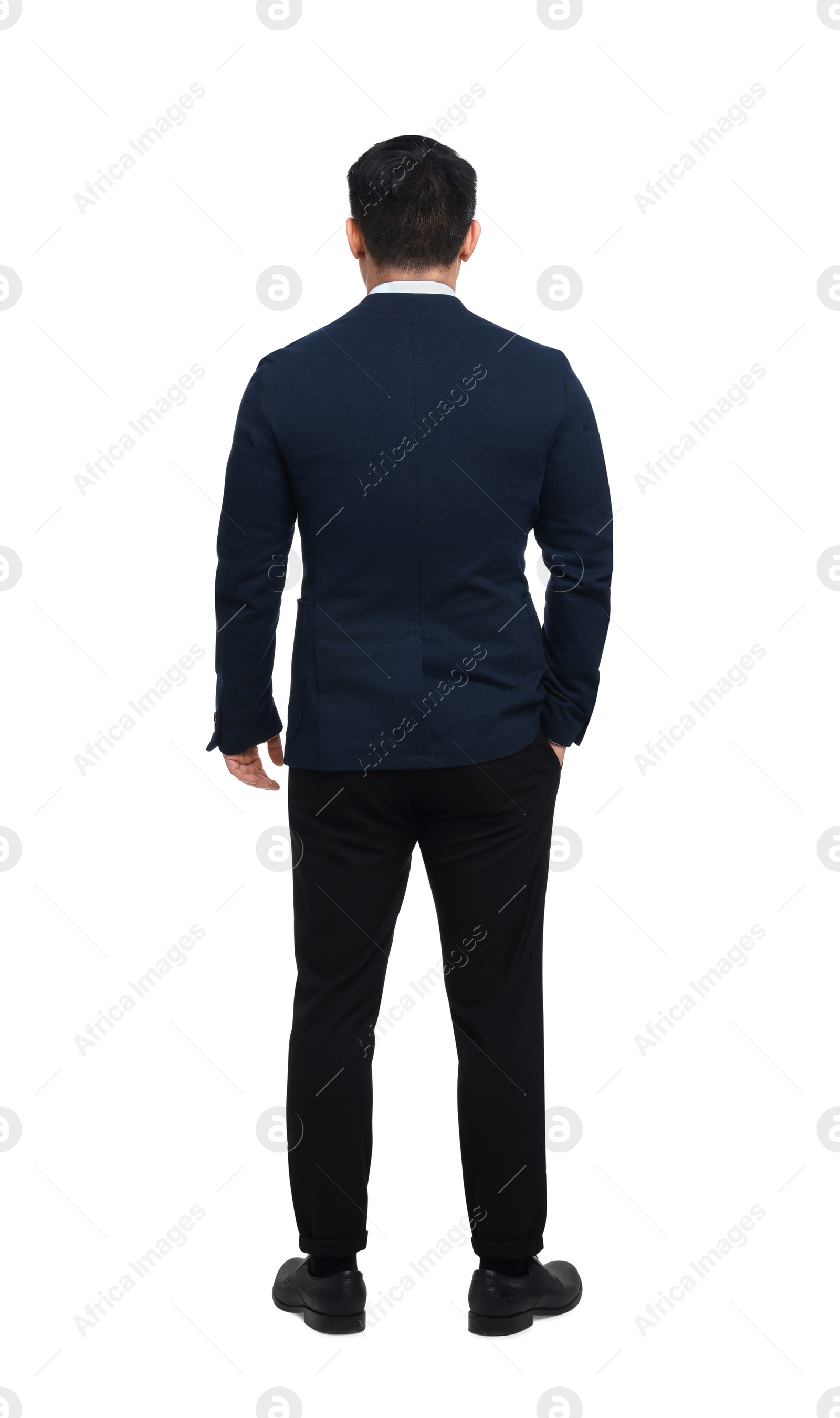 Photo of Businessman in suit posing on white background, back view