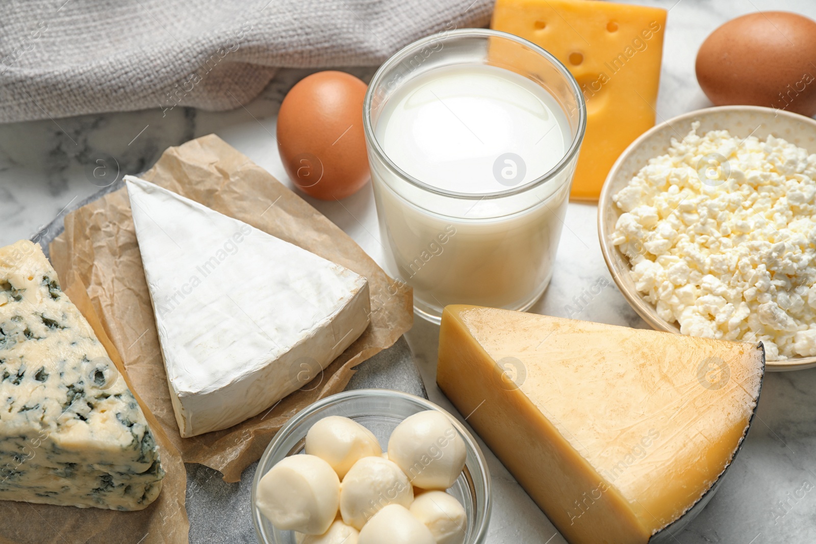 Photo of Different delicious dairy products on table, closeup