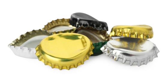 Photo of Group of different beer bottle caps isolated on white