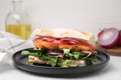 Photo of Delicious sandwich with schnitzel on white tiled table