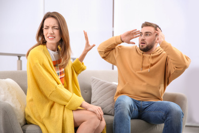 Couple having quarrel at home. Relationship problems