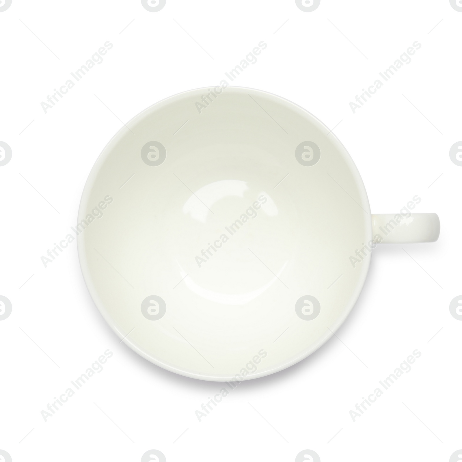 Photo of Empty ceramic cup isolated on white, top view