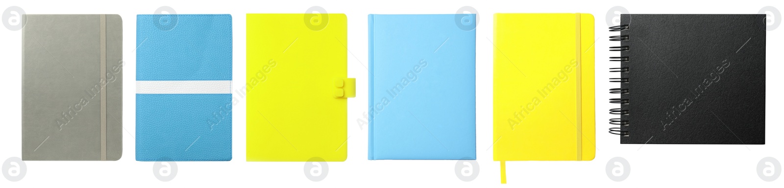 Image of Set with stylish colorful notebooks on white background, top view. Banner design