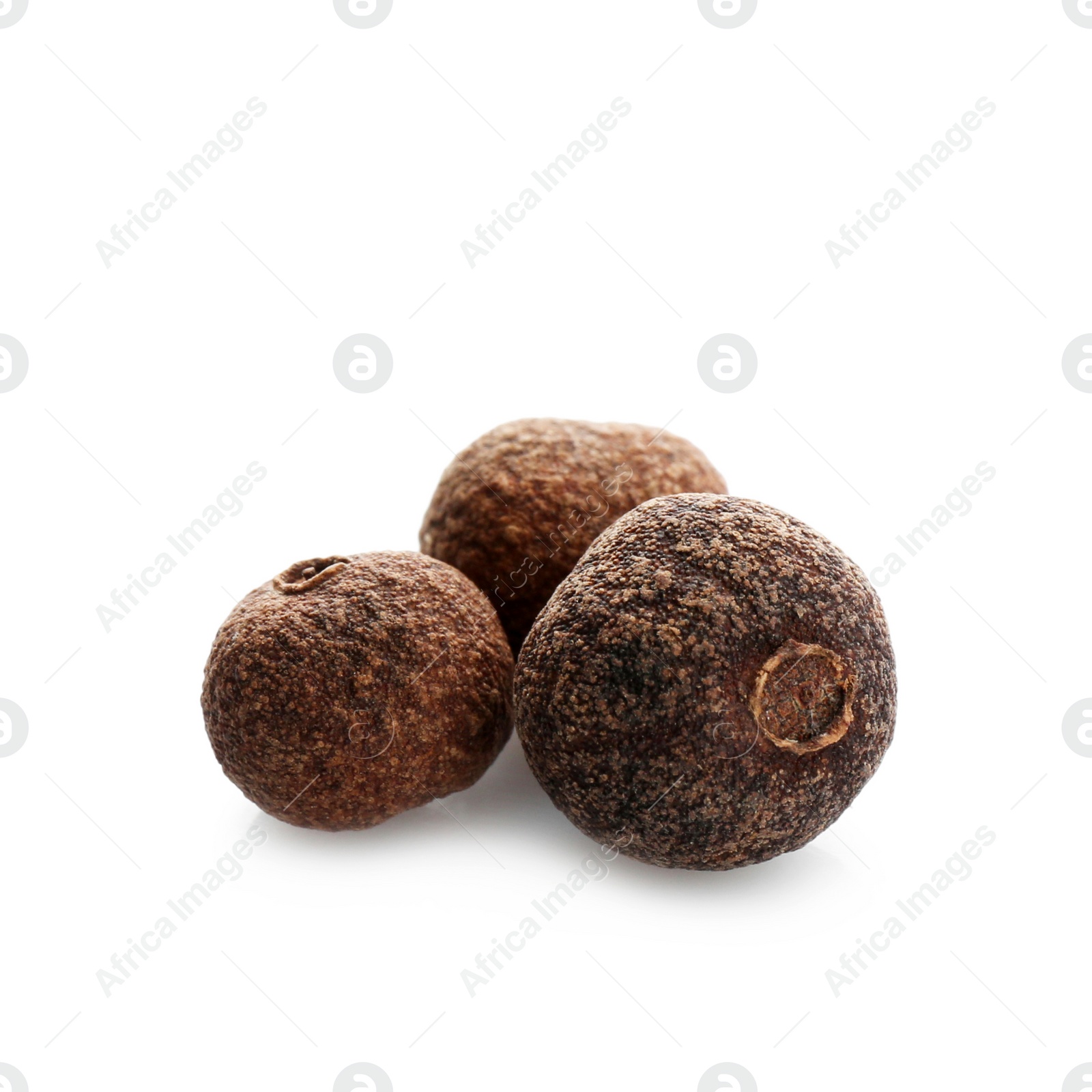 Photo of Allspice pepper grains on white background. Natural spice