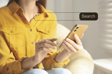 Image of Search bar of website over smartphone. Woman using device indoors, closeup