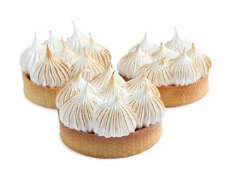 Tartlets with meringue isolated on white. Tasty dessert
