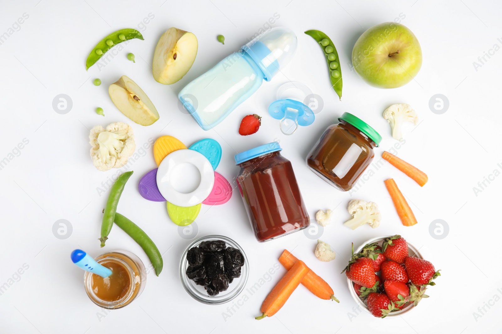 Photo of Flat lay composition with baby food, ingredients and accessories on white background