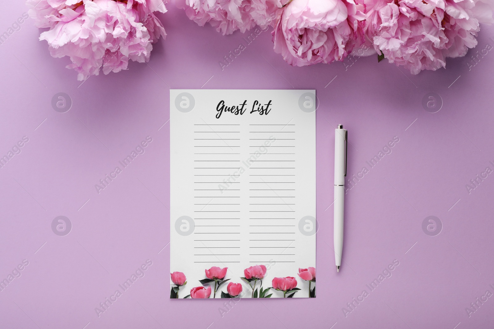 Photo of Guest list, pen and beautiful flowers on violet background, flat lay. Space for text