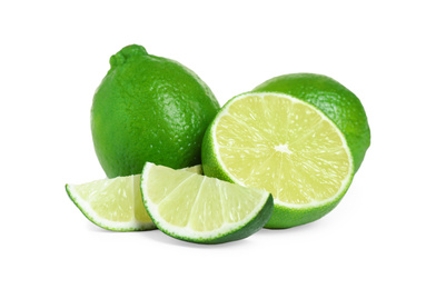 Photo of Fresh ripe green limes isolated on white