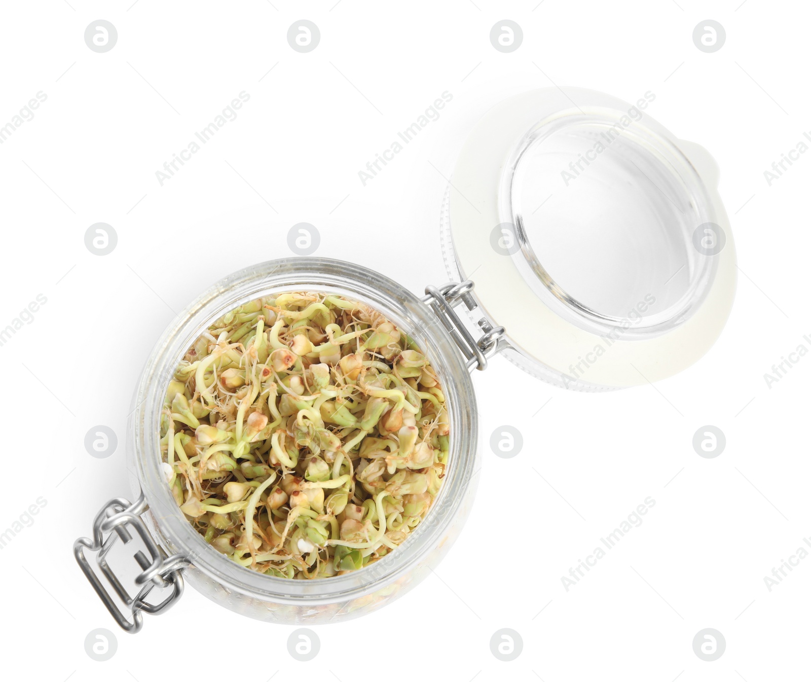 Photo of Glass jar of sprouted green buckwheat isolated on white, top view