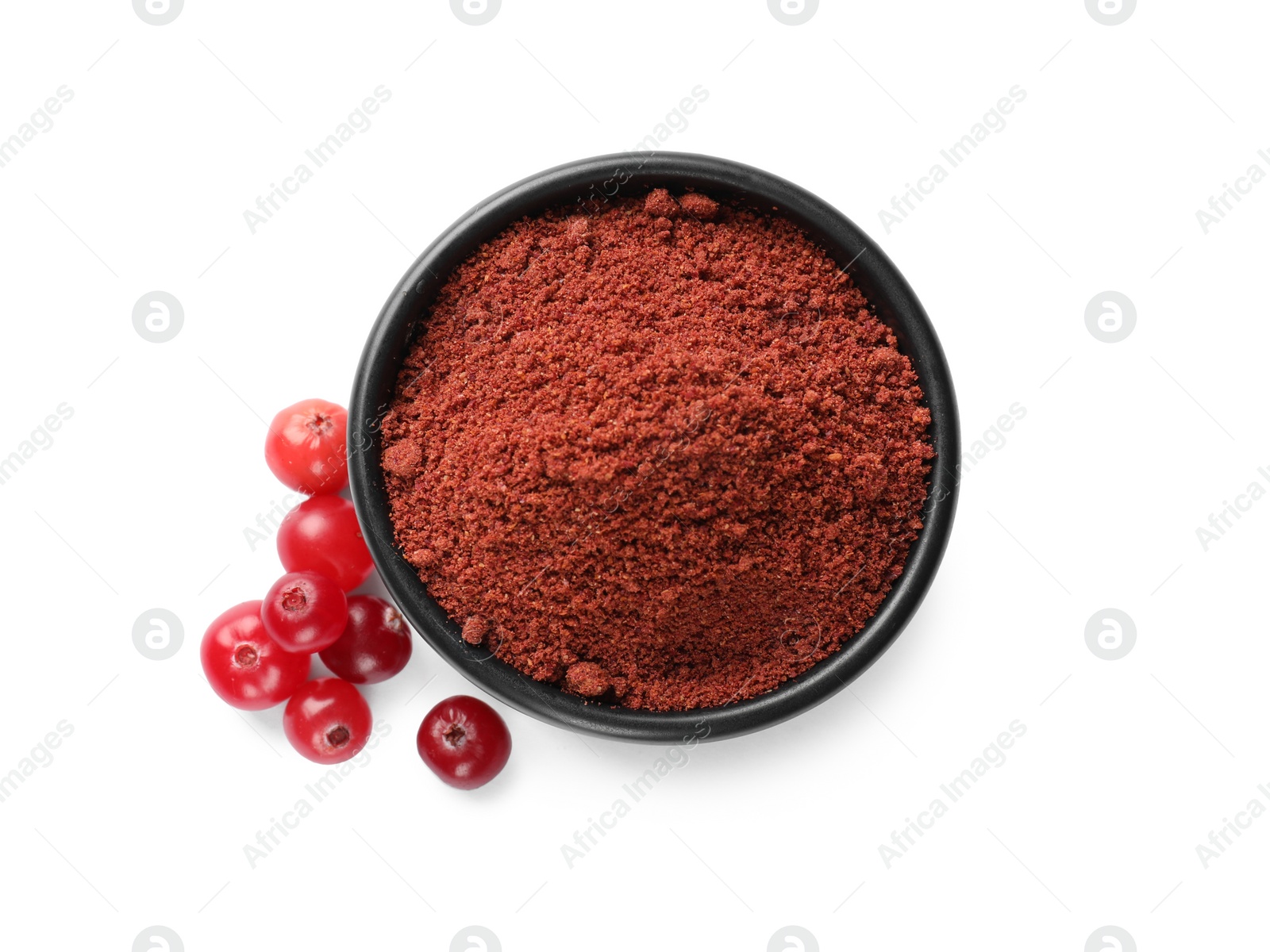 Photo of Cranberry powder in bowl and fresh berries isolated on white, top view