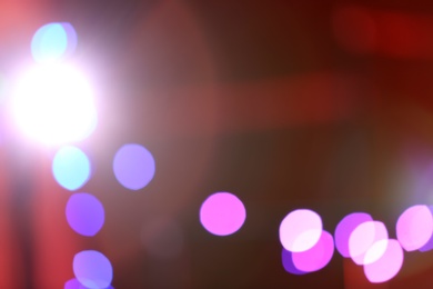 Blurred view of beautiful festive lights. Bokeh effect