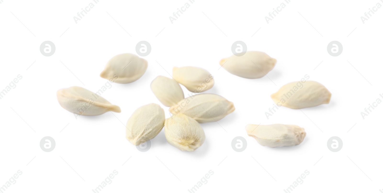 Photo of Many seeds of tangerine isolated on white