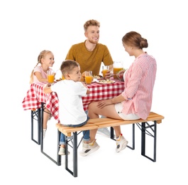 Photo of Happy family having picnic at table on white background