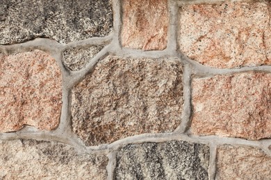 Photo of Texture of grey stone surface as background