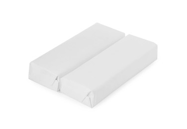 Photo of Packs of chewing gums on white background