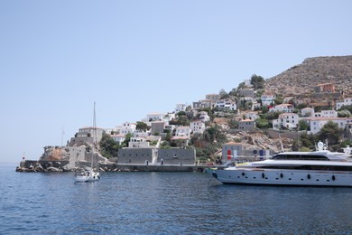 Beautiful view of sea with boats and coastal city