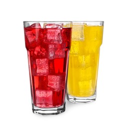 Glasses of different refreshing soda water with ice cubes isolated on white