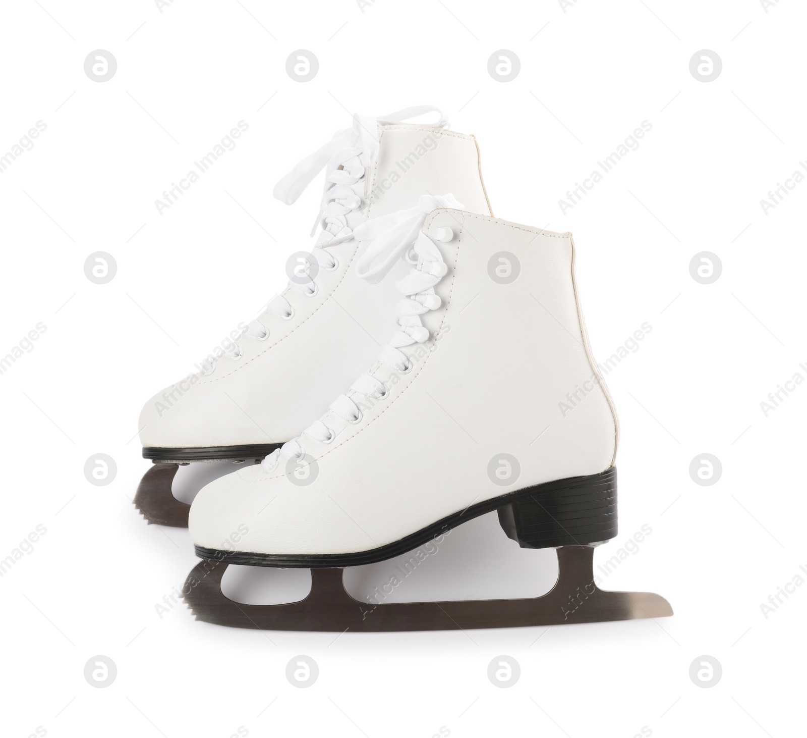 Photo of Pair of figure ice skates isolated on white, top view