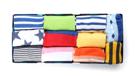 Photo of Box of child socks on white background, top view