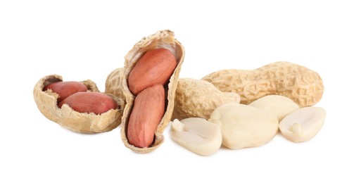 Photo of Fresh peanuts isolated on white. Healthy snack