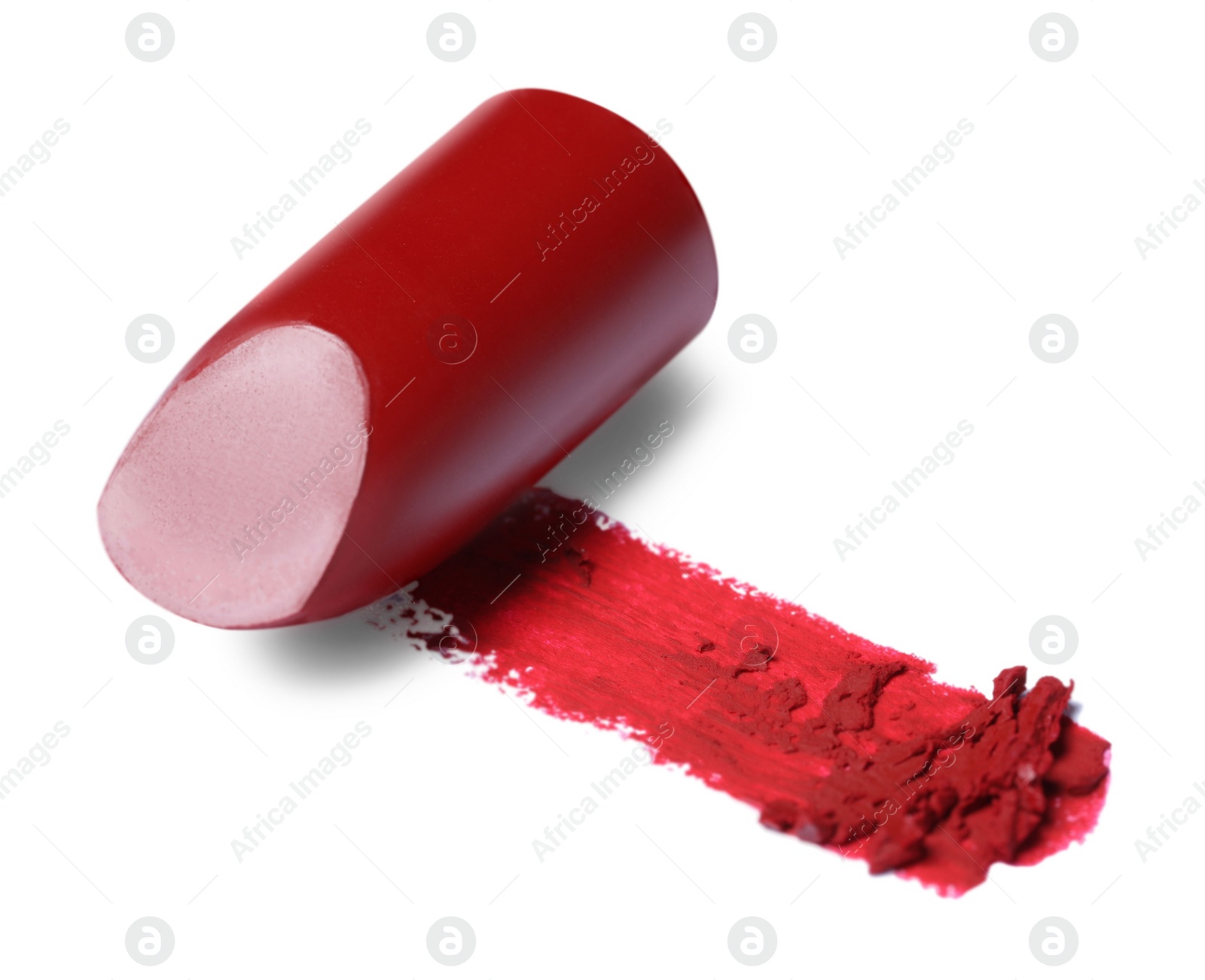 Photo of Red lipstick and smear isolated on white