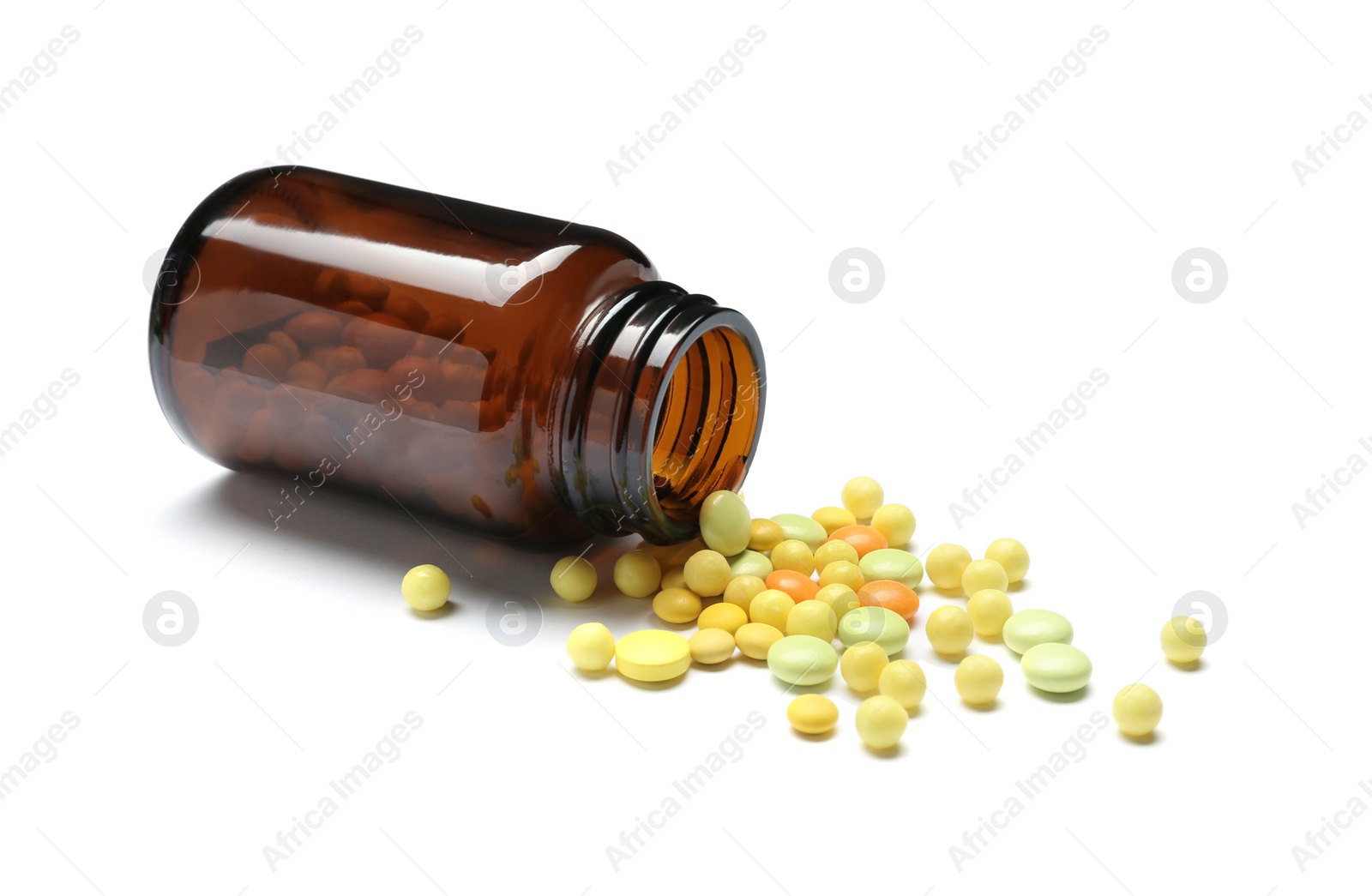 Photo of Bottle with vitamin pills on white background